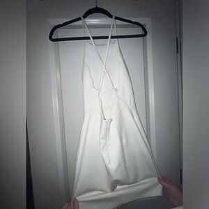White scalloped open back mini dress